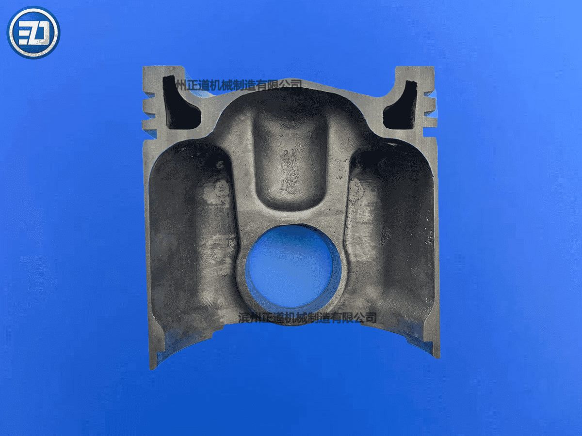 Ductile iron piston